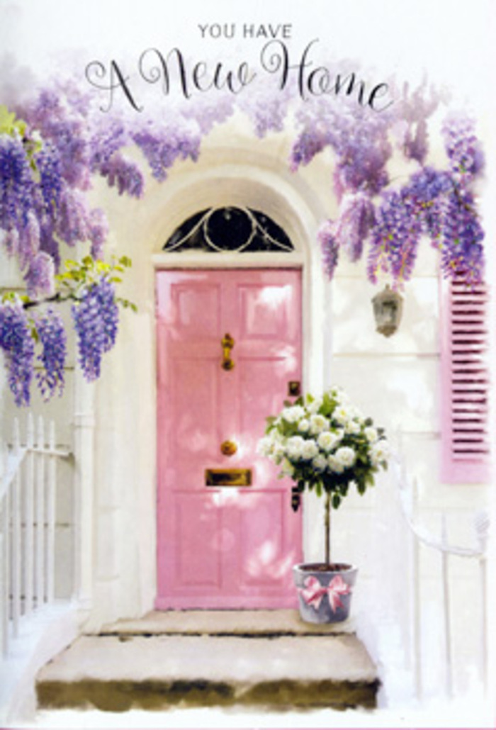 You can almost hear the rustle of unpacked boxes and the murmur of first conversations in this Purley doorway scene, as a new home is quietly christened with flowers. The focal point is a soft pink front door, painted in a calm, cheerful shade that stands out against its whitewashed surroundings. The texture of the paint appears smooth yet homely, catching the natural light that filters down from above. To one side, a similarly painted shutter completes the composition, its gentle tilt suggesting open windows and fresh air. Cloaking the upper frame of the doorway, wisteria cascades in generous swathes of lavender and lilac, each trailing cluster of blossoms forming a loose, fragrant curtain. The petals appear almost feathery at the edges, and the hanging flowers cast delicate shadows on the wall, bringing depth and movement to the scene. Resting on the stone step is a stylish grey bucket, the kind you might see used by a skilled local florist for relaxed, modern arrangements. It overflows with white and cream roses, their petals velvety and abundant, opening outwards in full, rounded blooms. Soft green foliage is tucked between the roses, adding texture and a hint of garden freshness, as though the flowers could have been picked from a nearby Purley back garden or park. Around the base of the bucket, a satin pink ribbon is tied in a graceful bow, its colour echoing the door and lending a final, romantic flourish. The overall mood is one of gentle optimism and homely warmth, ideal for a new home greeting card or a doorstep delivery across Purley, symbolising a heartfelt welcome and the beginning of treasured memories.